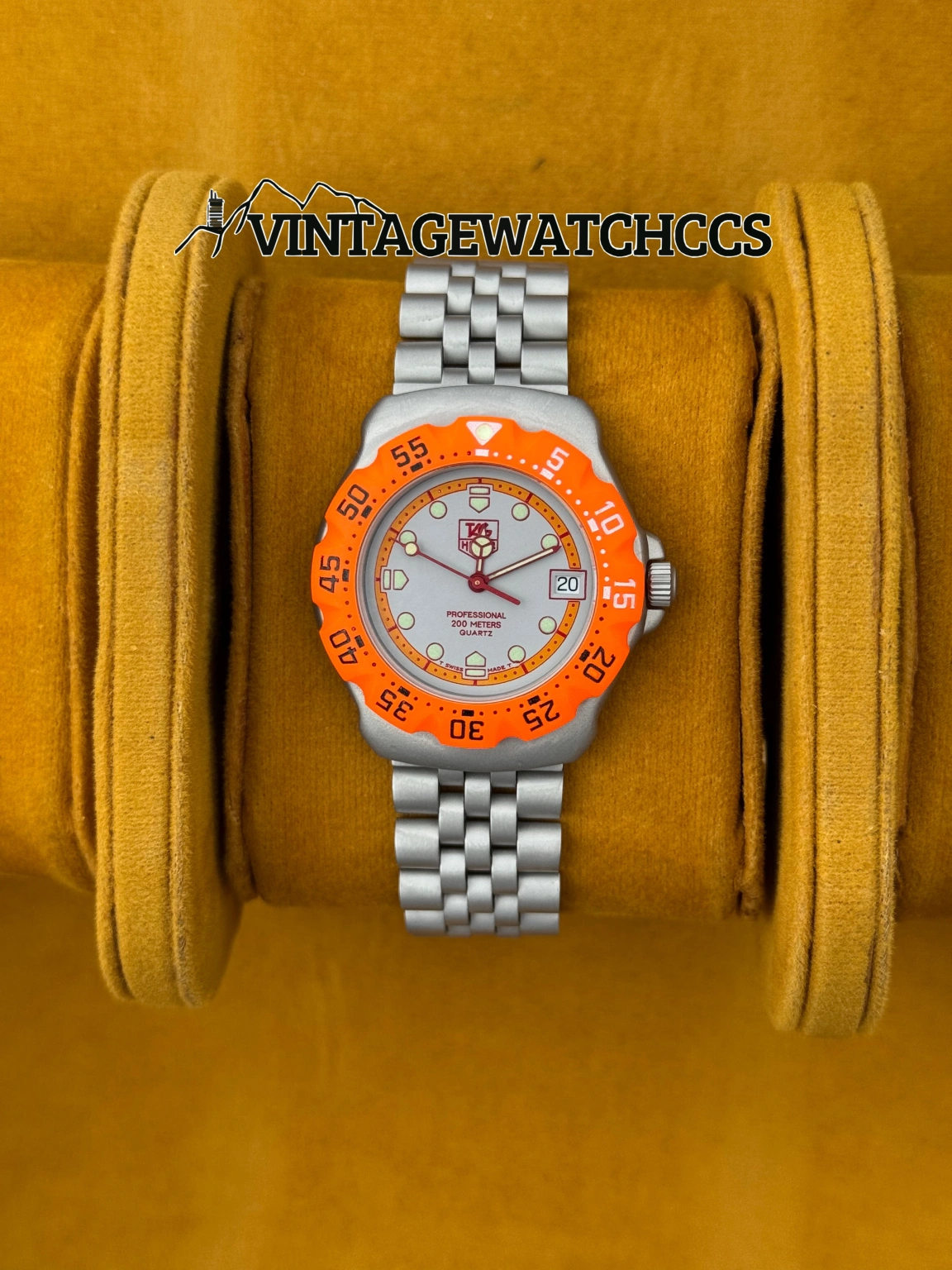 TAG Heuer Formula 1 bisel naranja, brazalete de acero